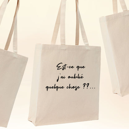 Sac cabas 21L beige avec texte " Est-ce que j'ai oublié quelque chose ?? ... ". Création Virginie Linard.