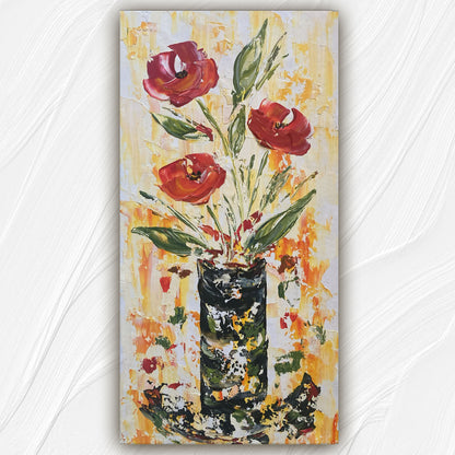 Tableau Trois fleurs rouge avec feuillage dans un vase fond jaune et blanc. Peinture sur toile format 30x60cm. Original et unique. Création Virginie Linard ©.