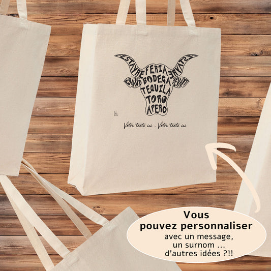 Taureau Camargue Bodega Feria, graphisme sur sac tote-bag 21 litres beige, à personnaliser avec un texte. Création Virginie Linard ©.